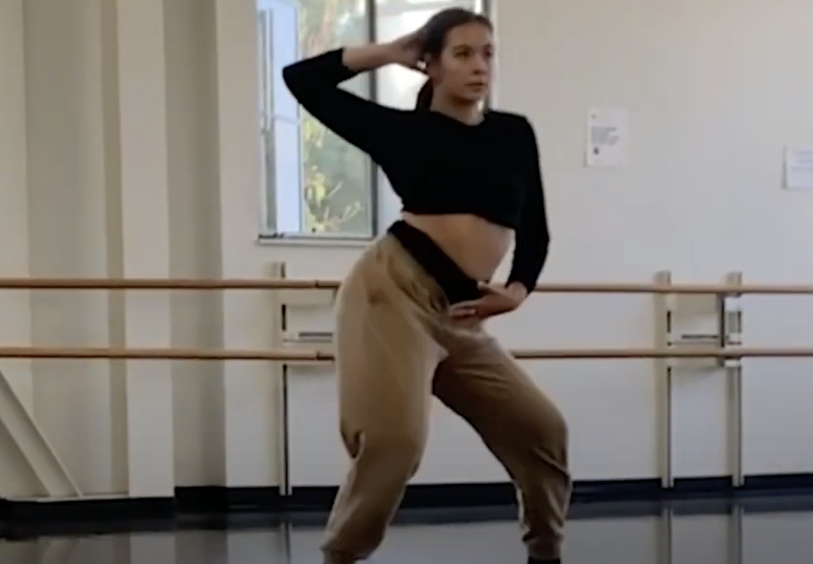a woman in mid dance performance